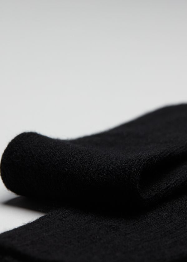Meias compridas caneladas masculinas em lã e cashmere.