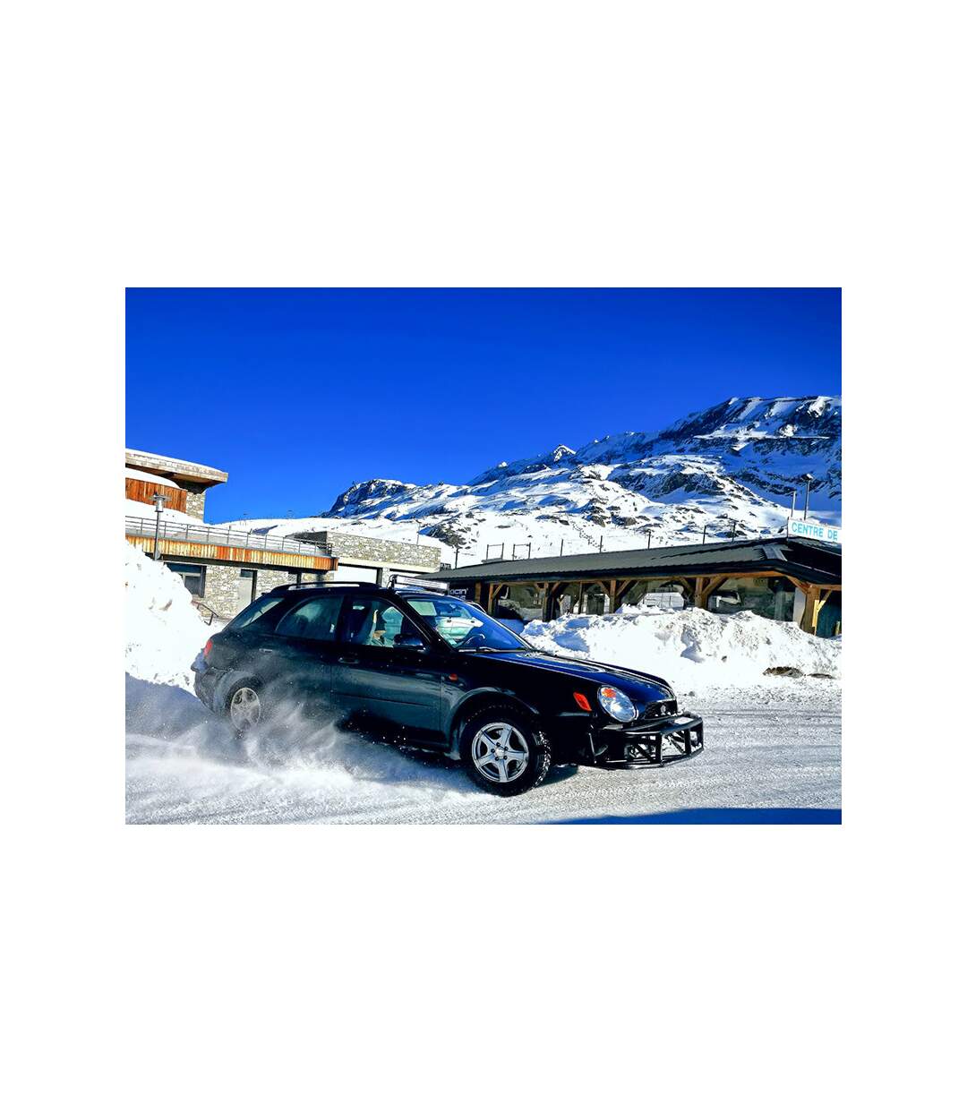 Pilotage sur glace d'une voiture de sport à l'Alpe d'Huez - SMARTBOX - Coffret Cadeau Sport & Aventure