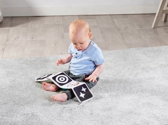 Tiny Love Pedagogisk matte Gymnastikk for baby med sløyfer - Magic Land - svart og hvit