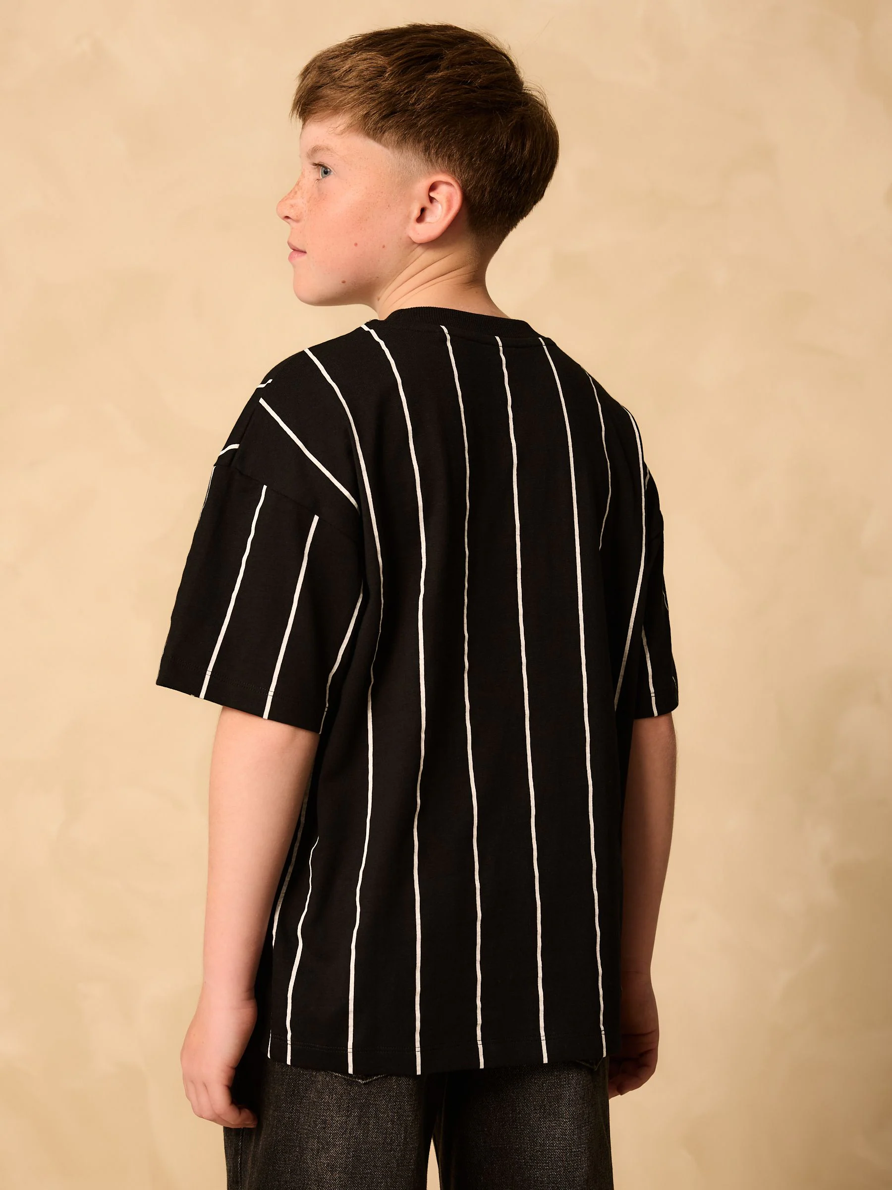 Zwart-witte streep - Ruimvallend T-shirt met print en korte mouwen (3-16 jr)