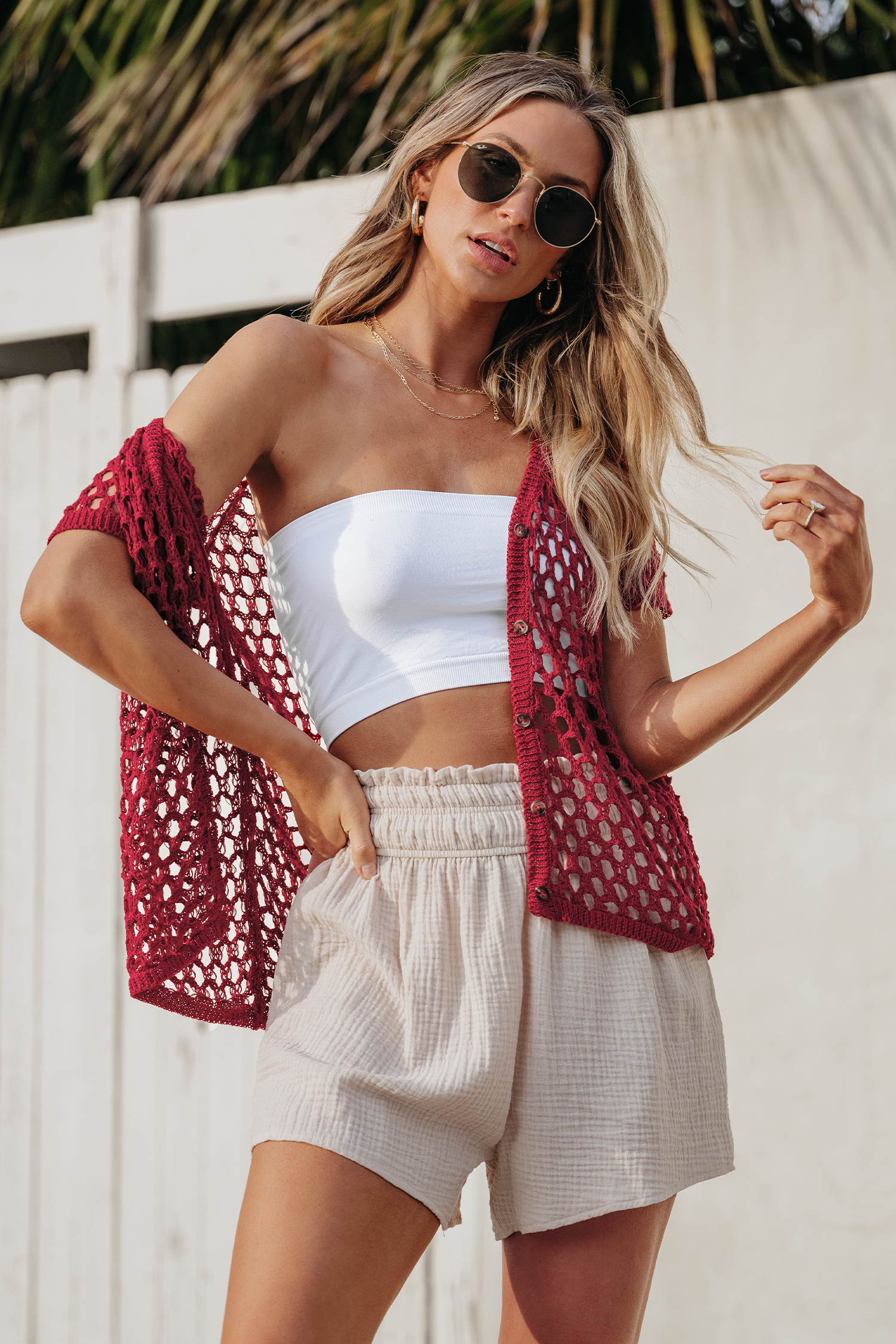 Haut cover up en tricot ouvert à boutons sur le devant
