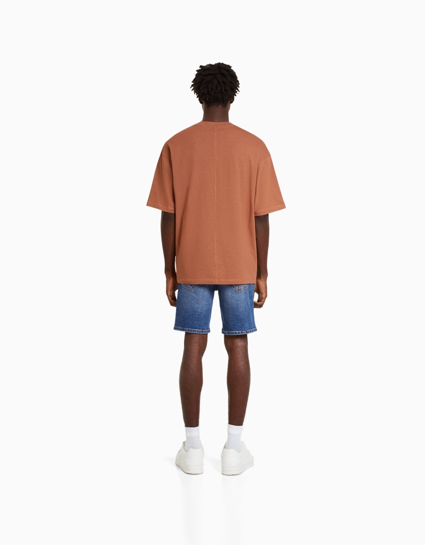 Bermuda jeans rasgada