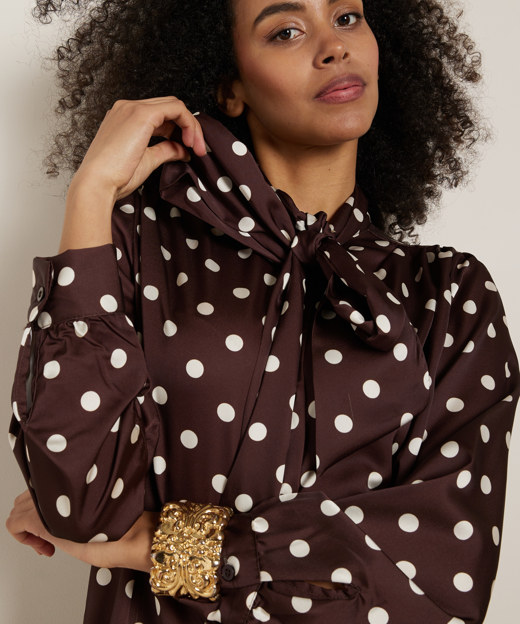 strik blouse met stippenprint