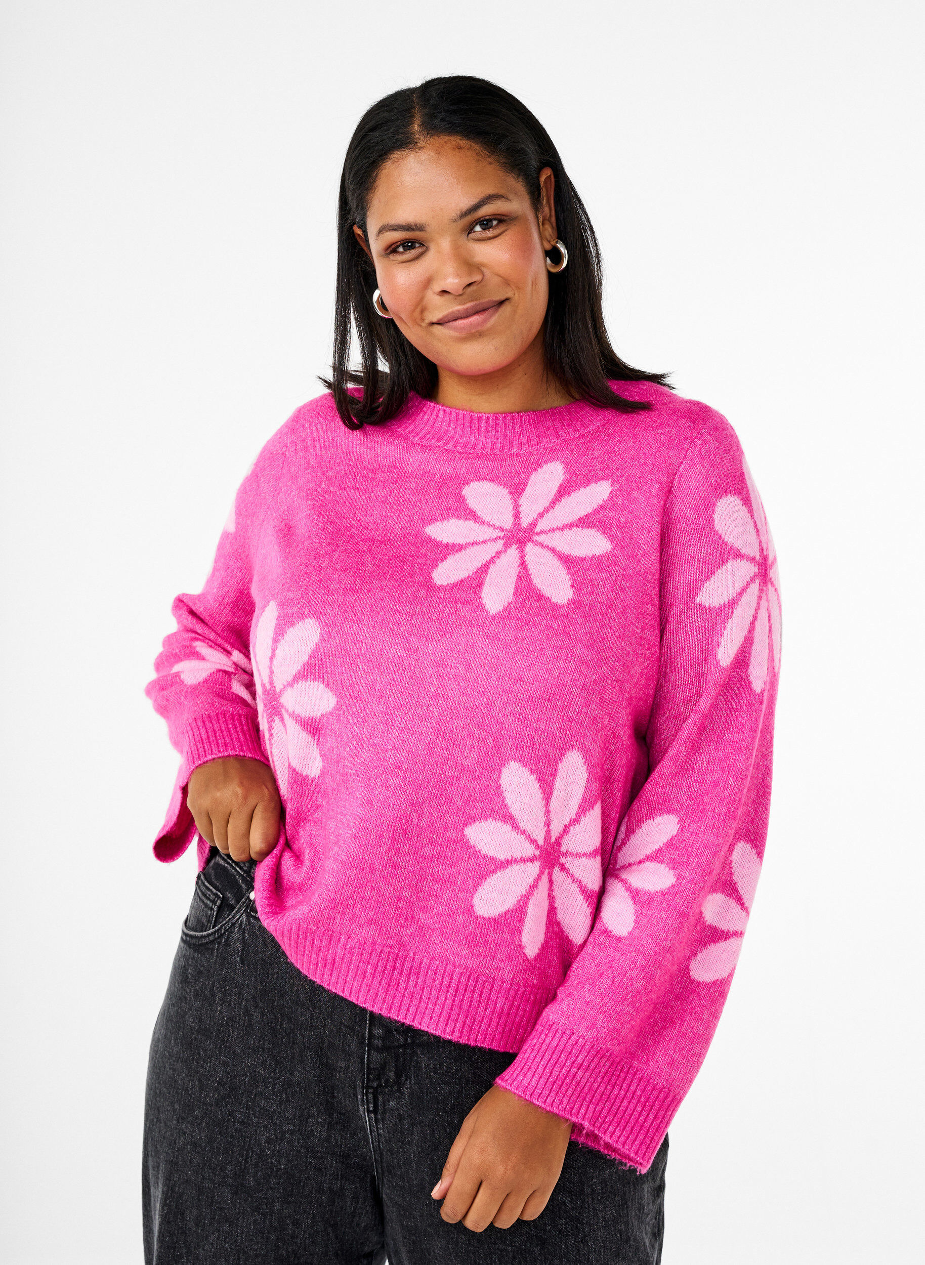 Strikbluse med blomster
