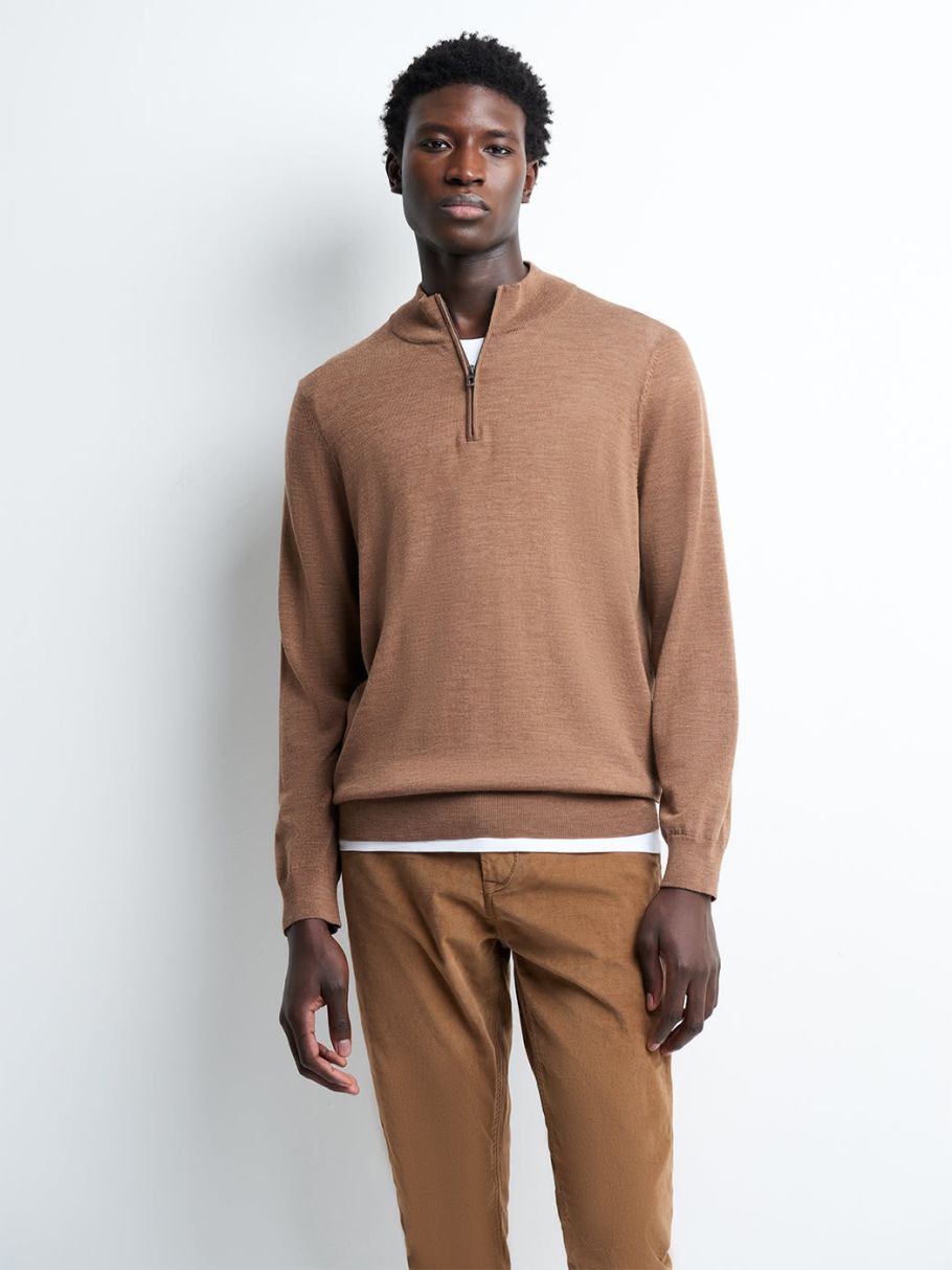 Pull col montant zippé en laine mérinos
