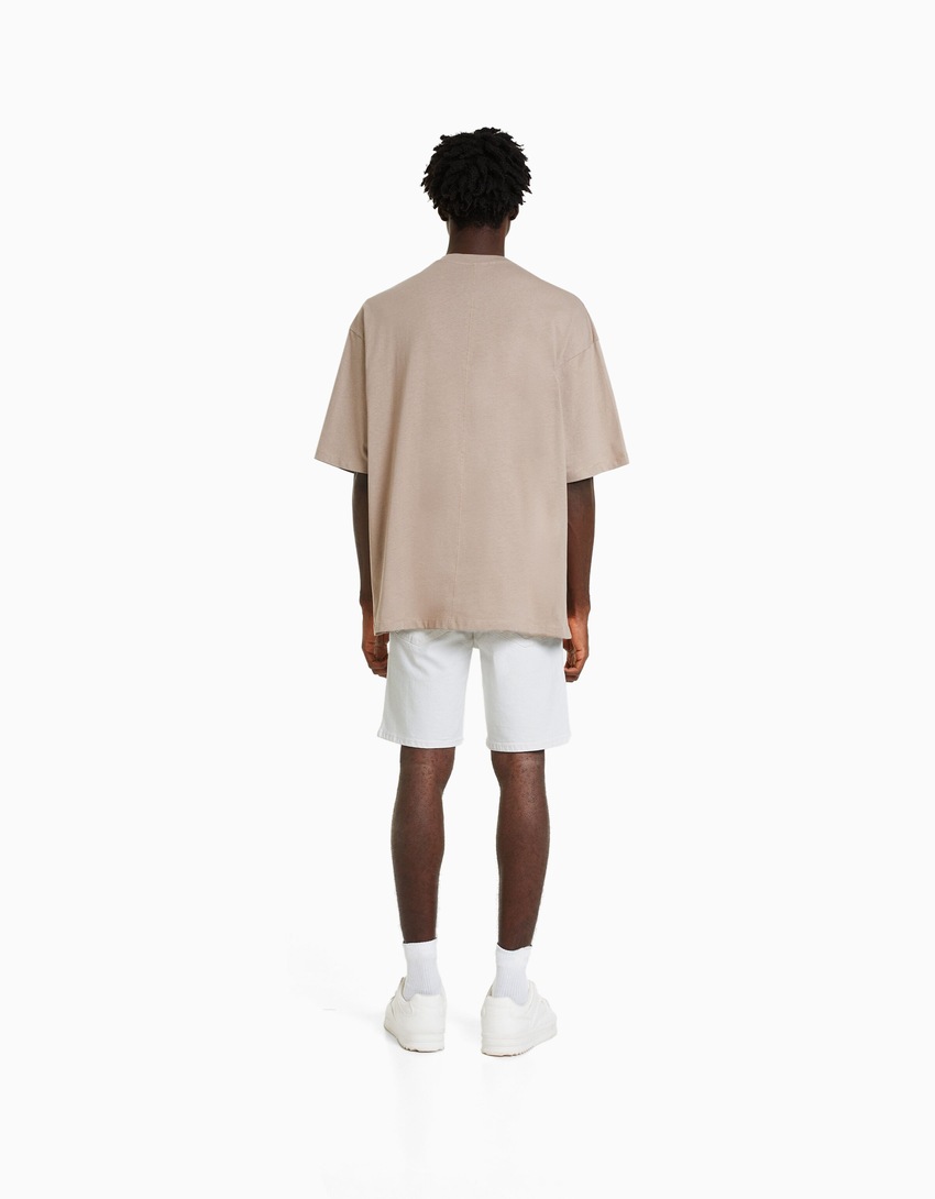 Bermuda jeans rasgada
