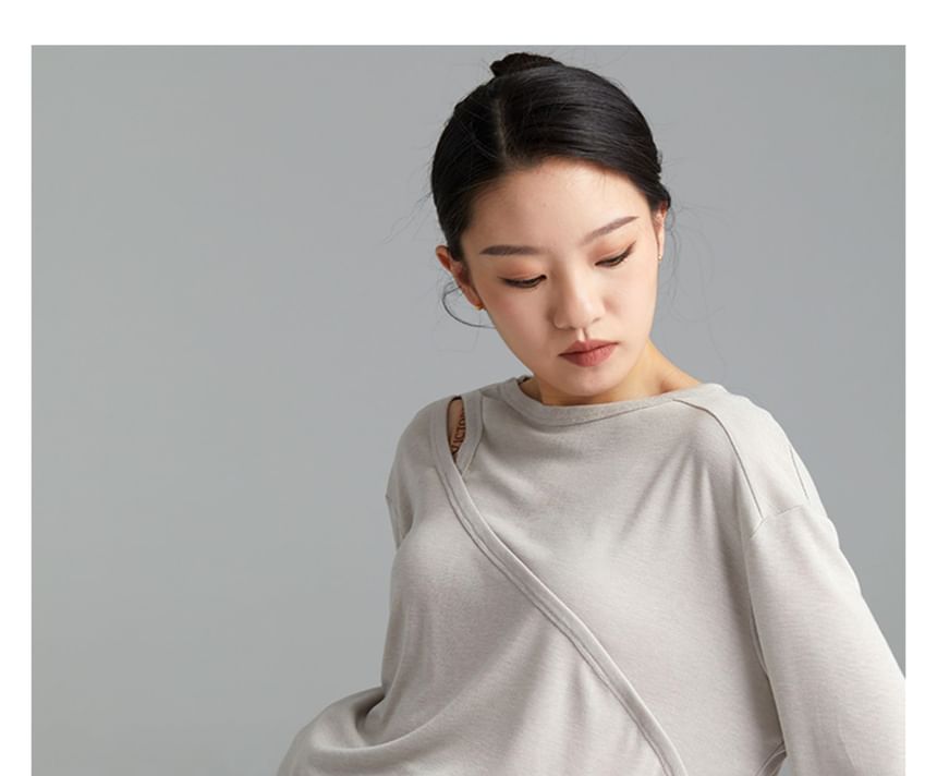 Cossita - Asymmetrische danstop met lange mouwen en ronde hals