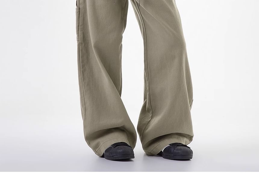 Rosesand - Lage taille jeans met geborduurde letters en wijde pijpen