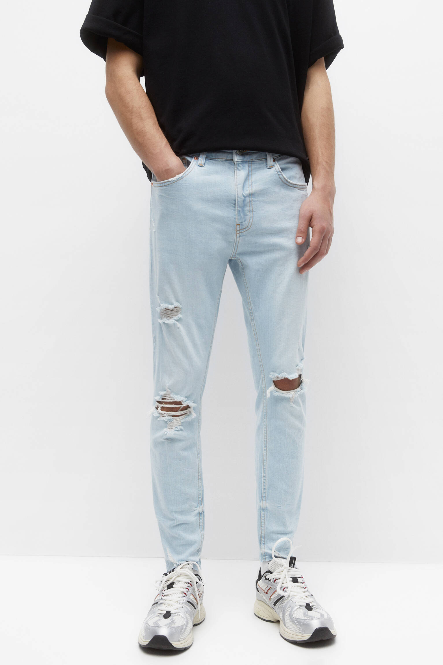 CALÇA JEANS SKINNY RASGADA - AZUL CLARO