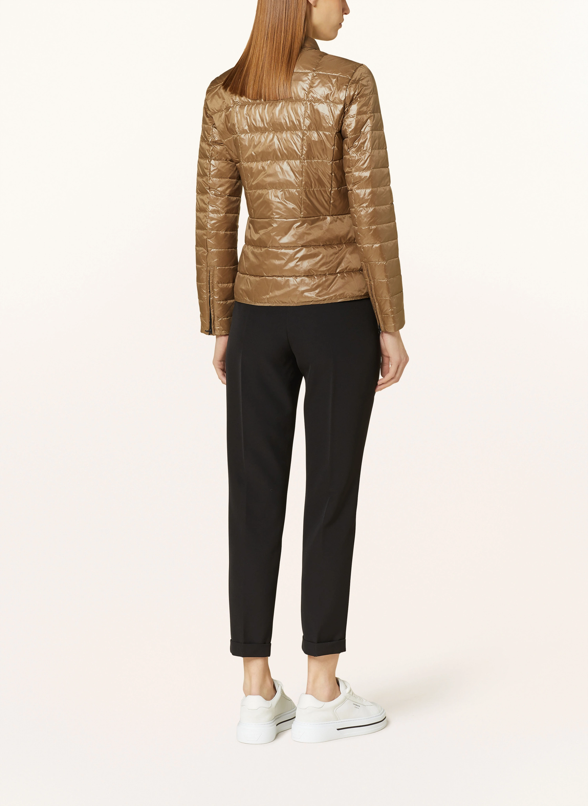 Blauer Steppjacke mit SORONA® AURA-Isolierung