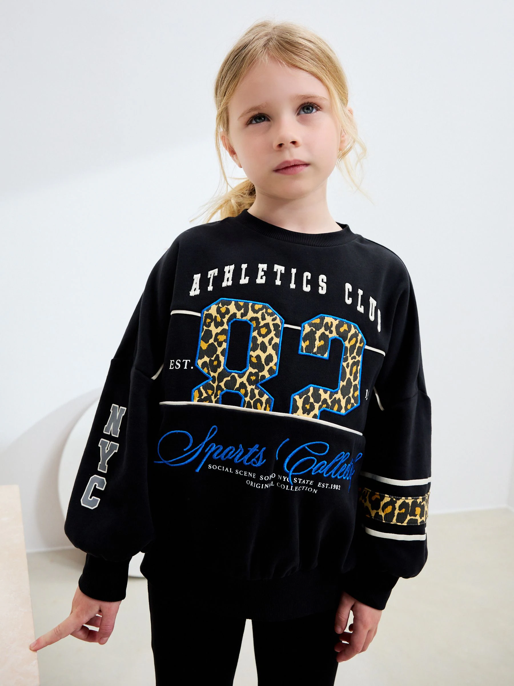 Zwart met dierenprint - Sweatshirt met slogan (3 - 16 jr)