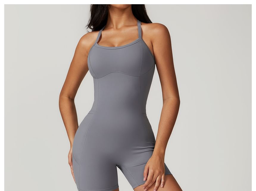 Skinniano - Yoga romper met spaghettibandjes en effen paneel