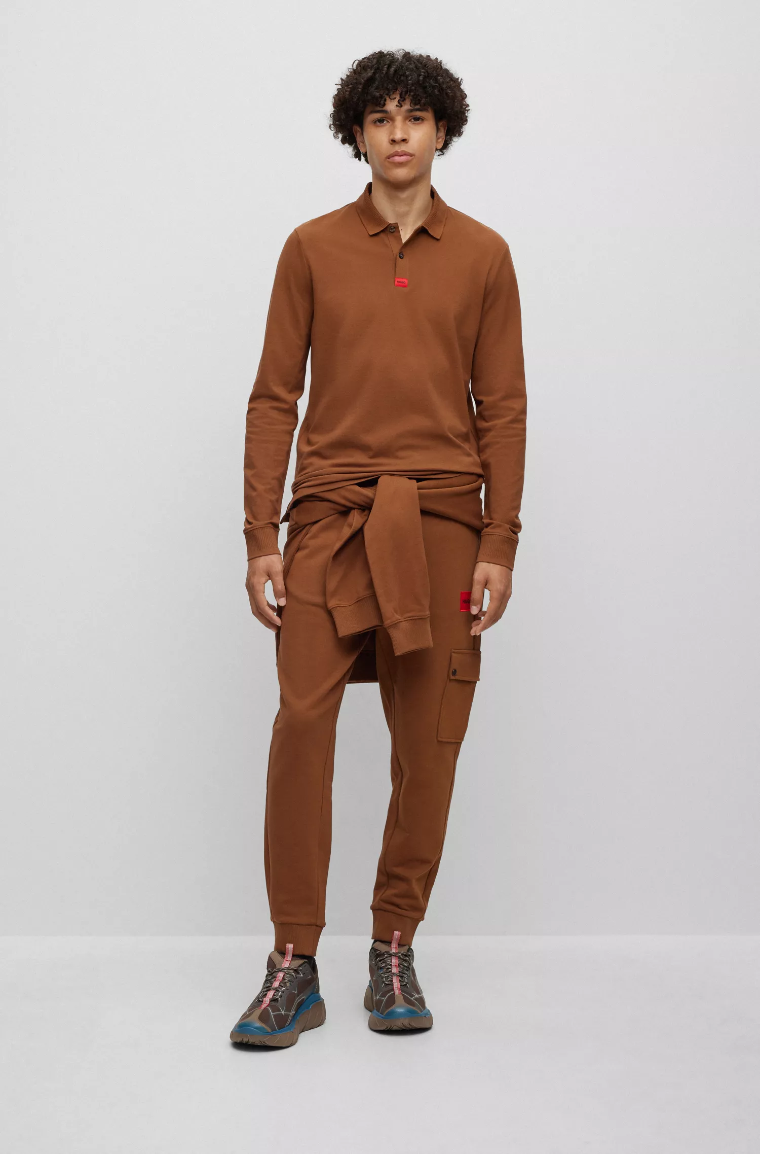 Camisa polo HUGO vermelha em piqué de algodão com corte slim e etiqueta com o logotipo.