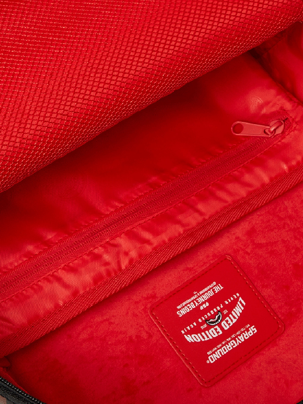 Sprayground Peeking Character Check Backpack uni