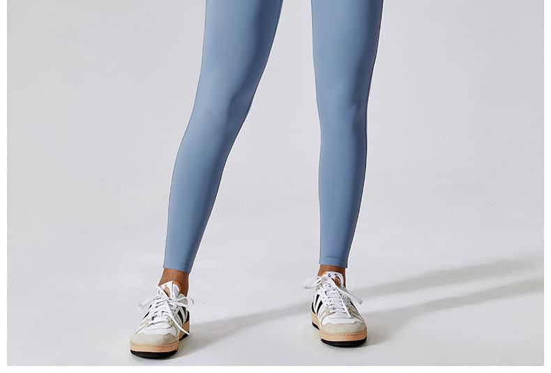 Skinniano - Sportjumpsuit met korte mouwen en halve rits