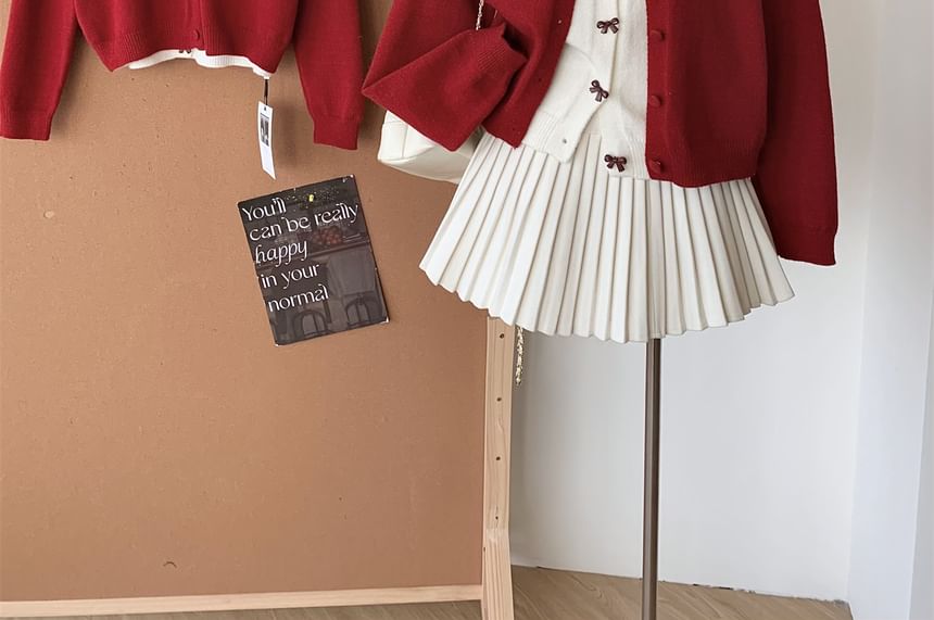 Dute - Mock tweedelig vest met ronde hals en strikborduursel
