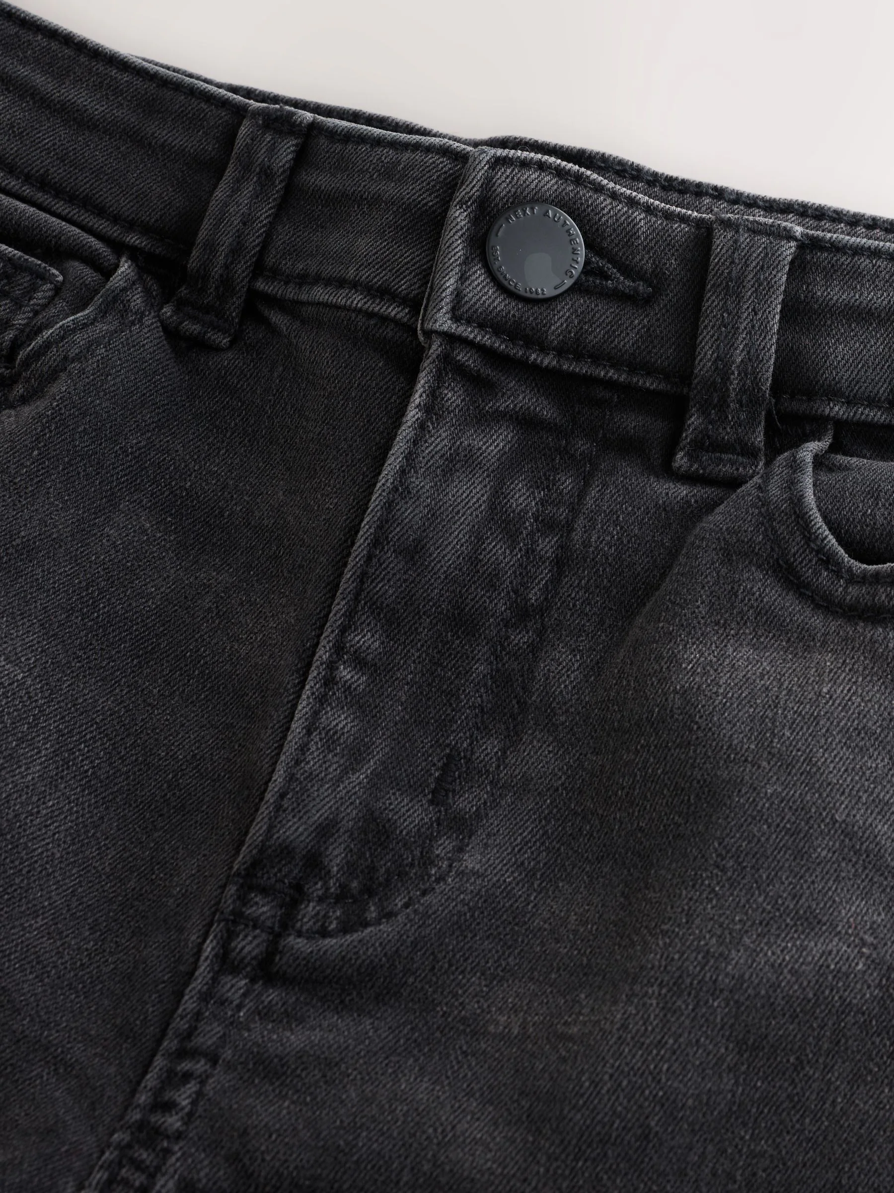 Zwarte wassing - Stretchjeans (3-17jr)