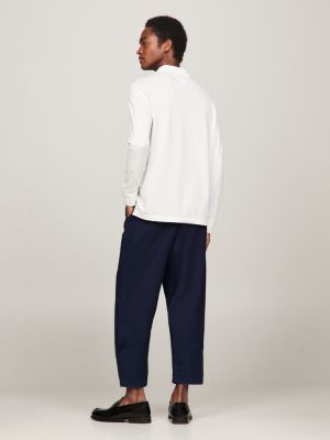 Polo de manga comprida com estampa listrada global e modelagem regular.