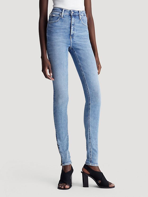 Calça jeans super skinny de cintura alta com zíper na barra