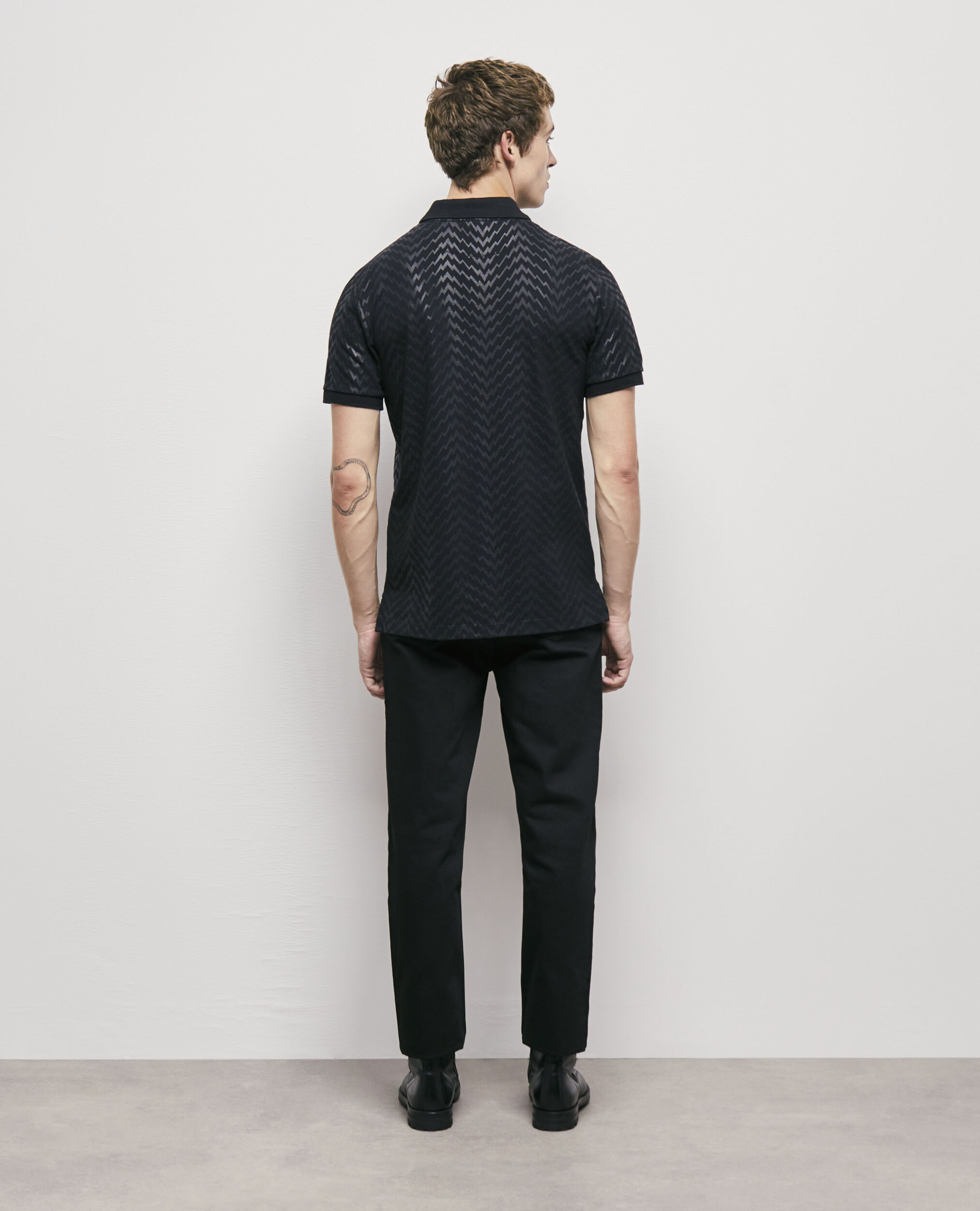 Polo noir imprimé