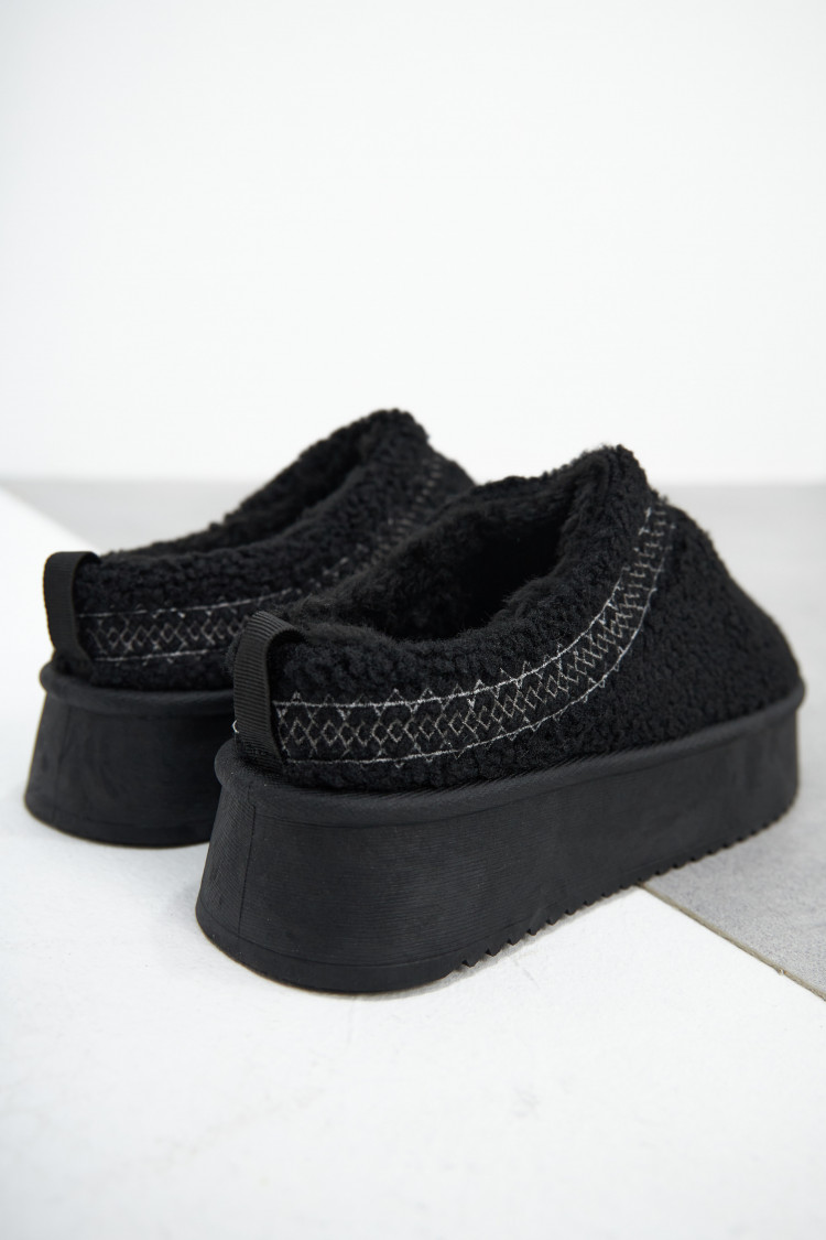 Bottines chaussons en peau de mouton compensés noires