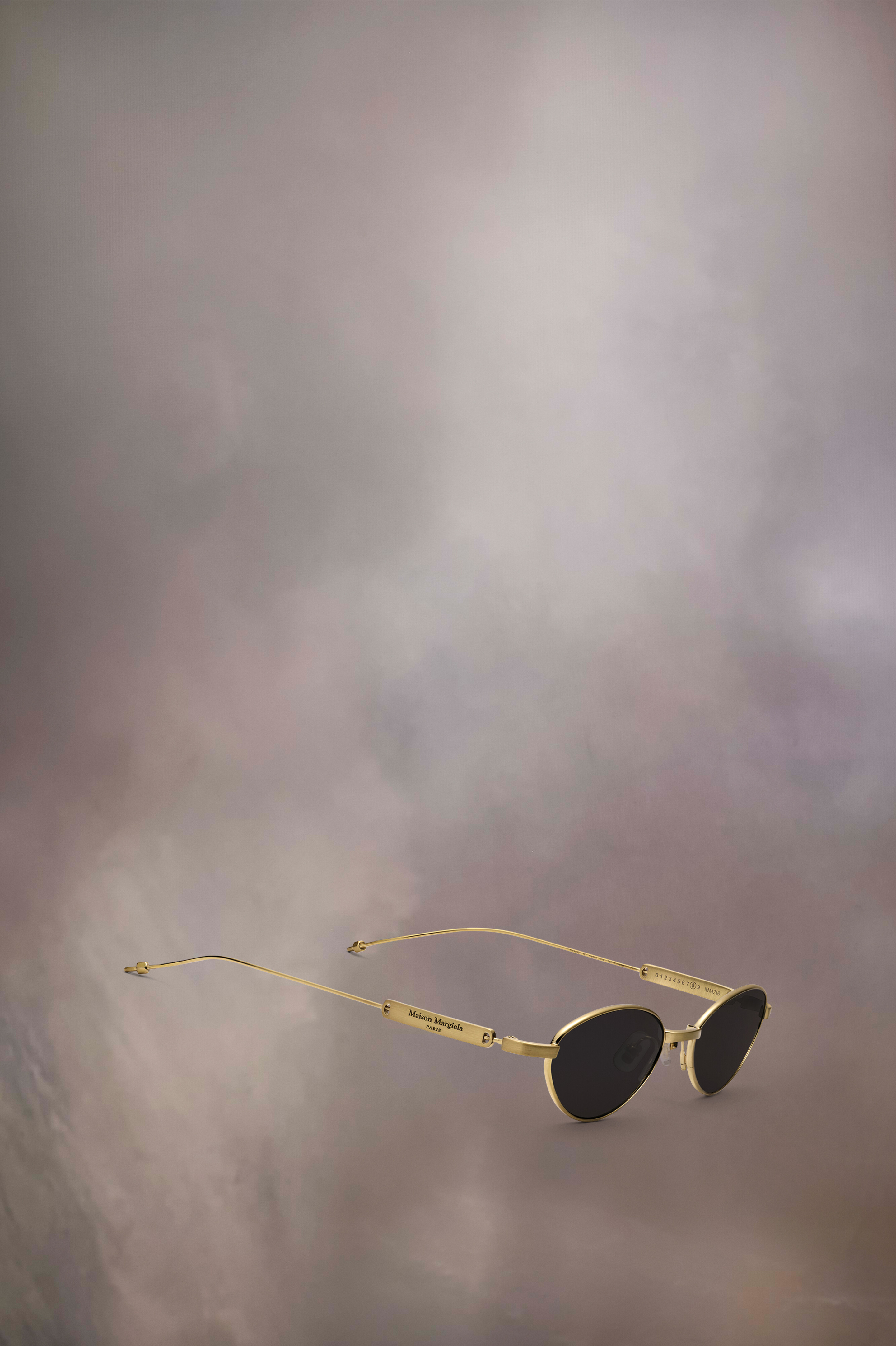 Lunettes de soleil incurvées dorées x Gentle Monster​