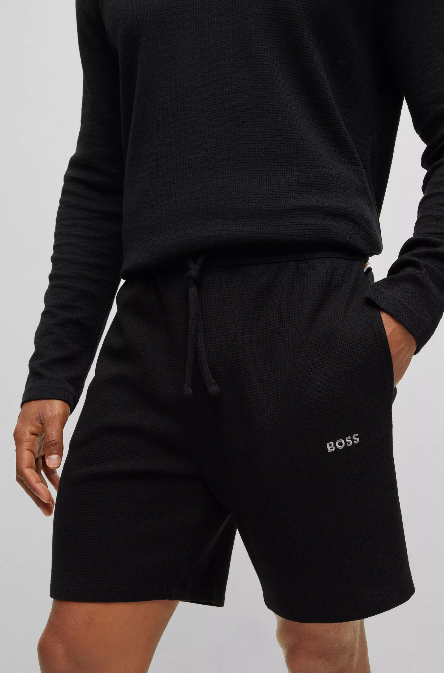 Calções de pijama BOSS em mistura de algodão preto com logotipo bordado.
