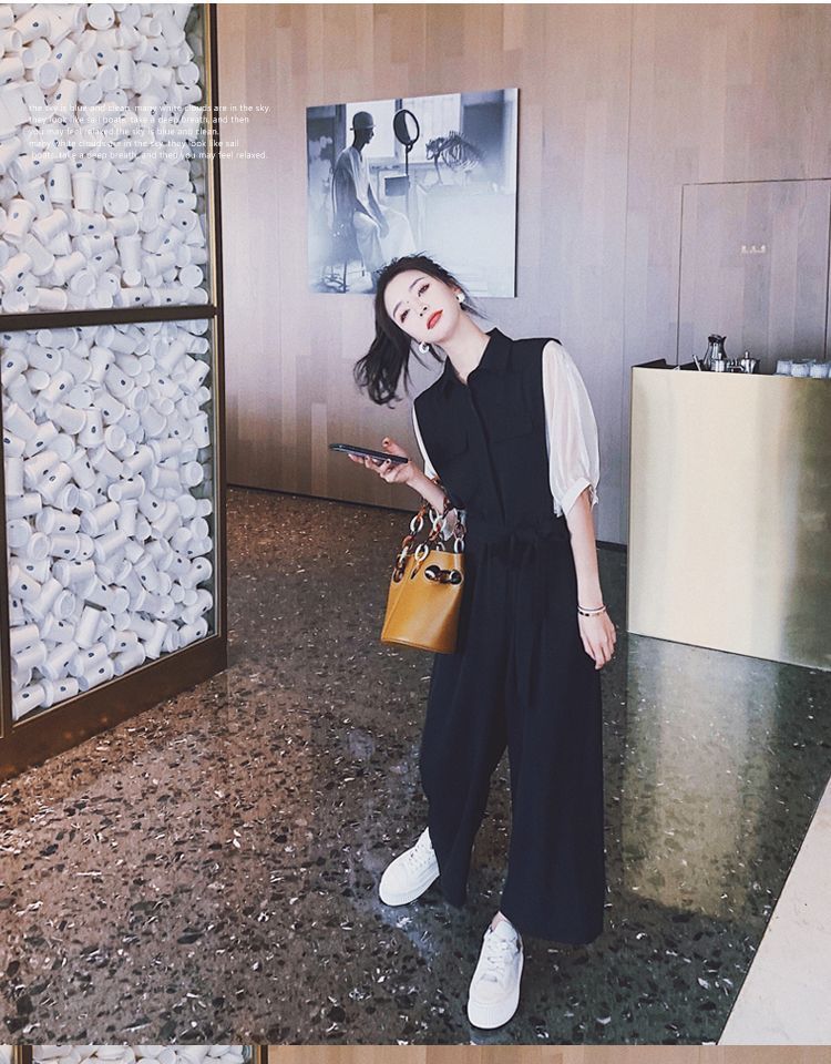 Tzarkozy - Tweekleurige jumpsuit met pofmouwkraag