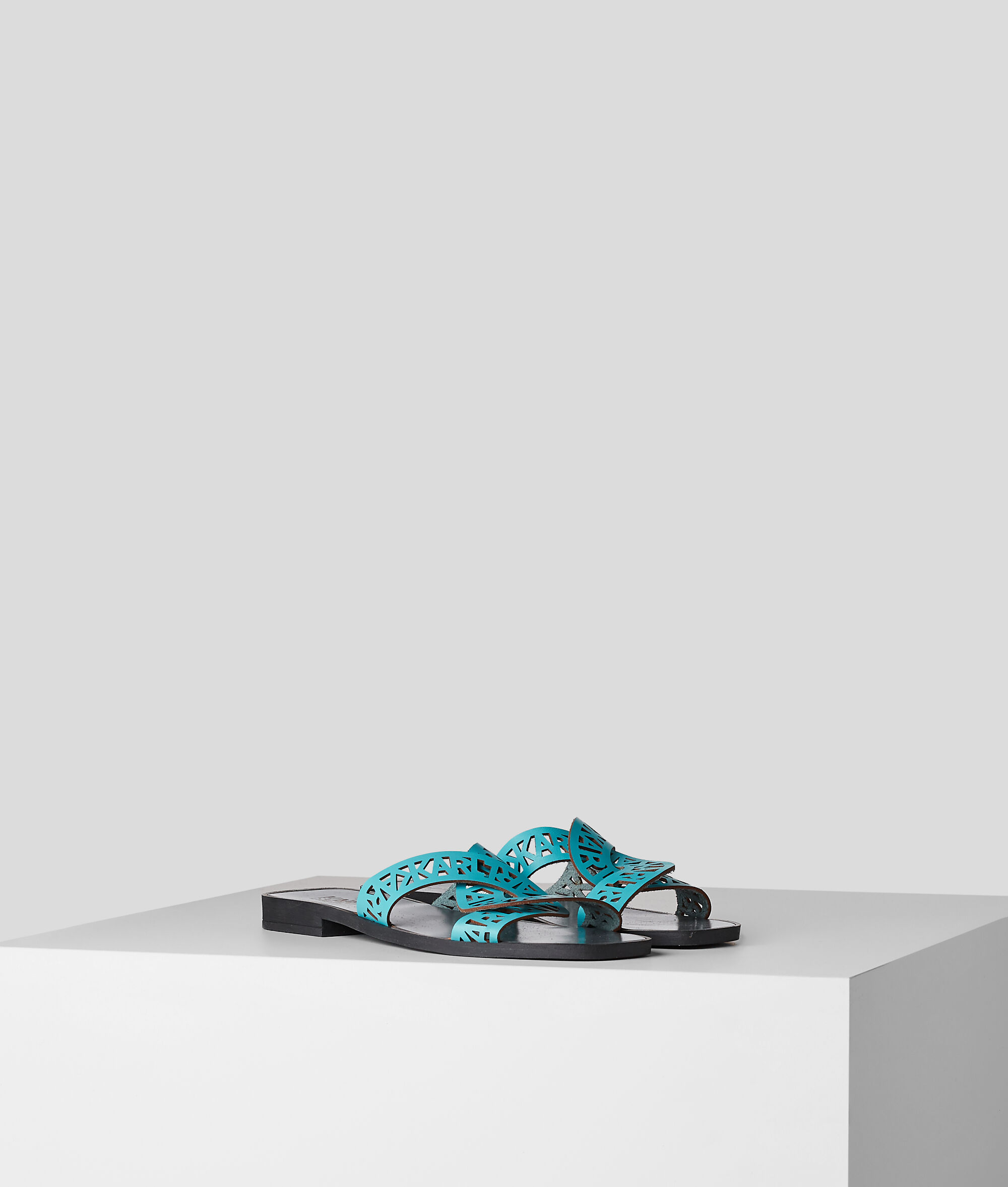Mules à boucle Interlok Skoot