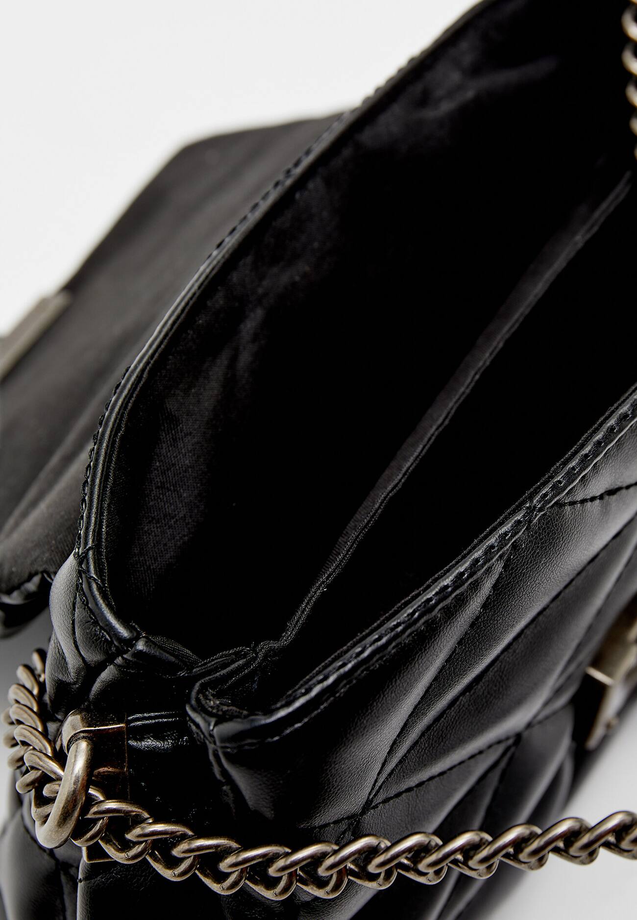 Bolsa transversal pequena com estampa geométrica acolchoada