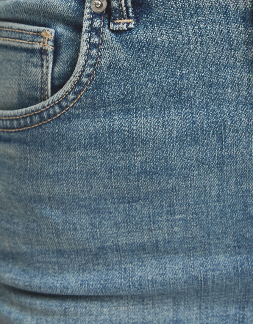 calça jeans skinny de cintura super alta