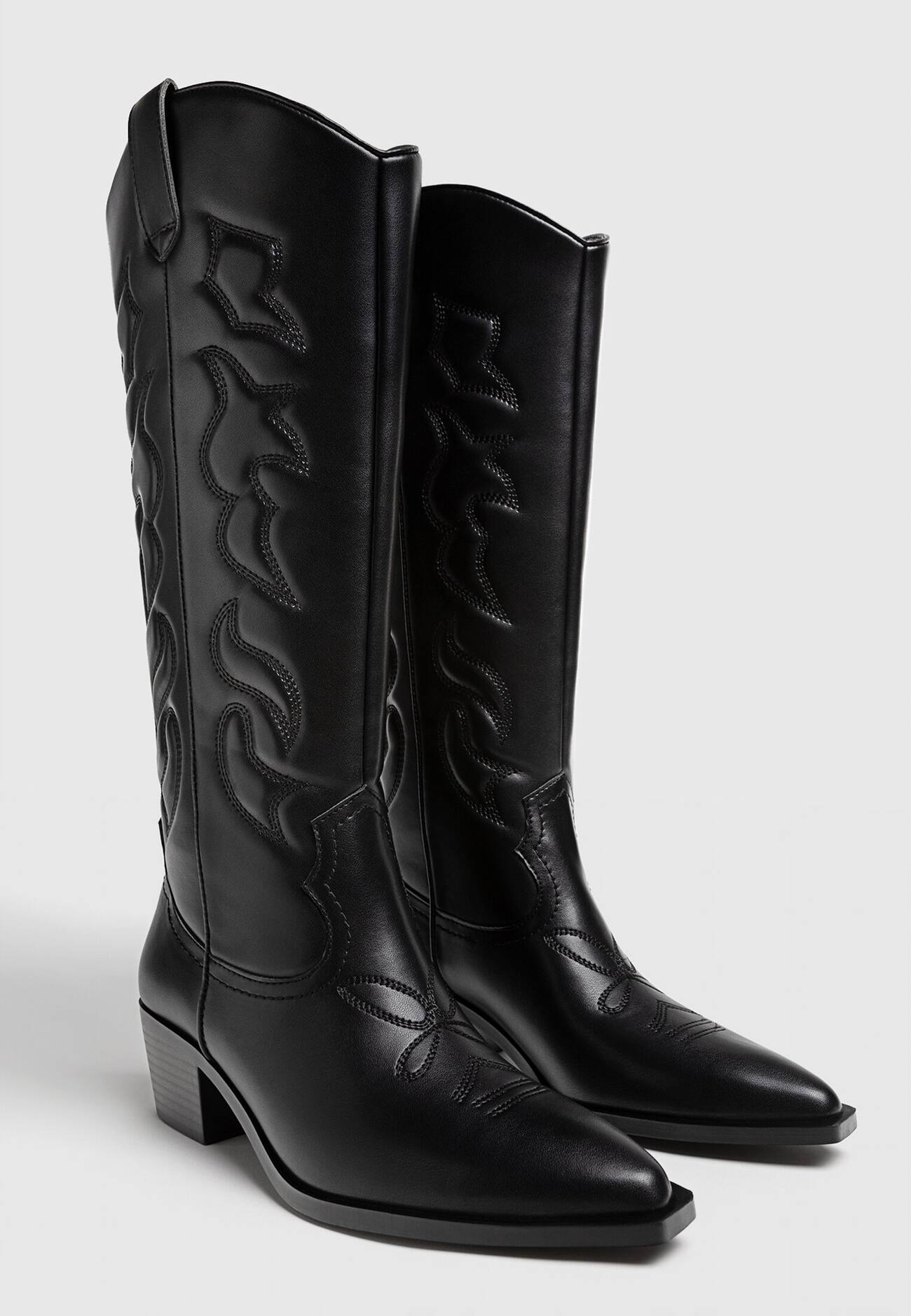 Botas de cowboy até o joelho