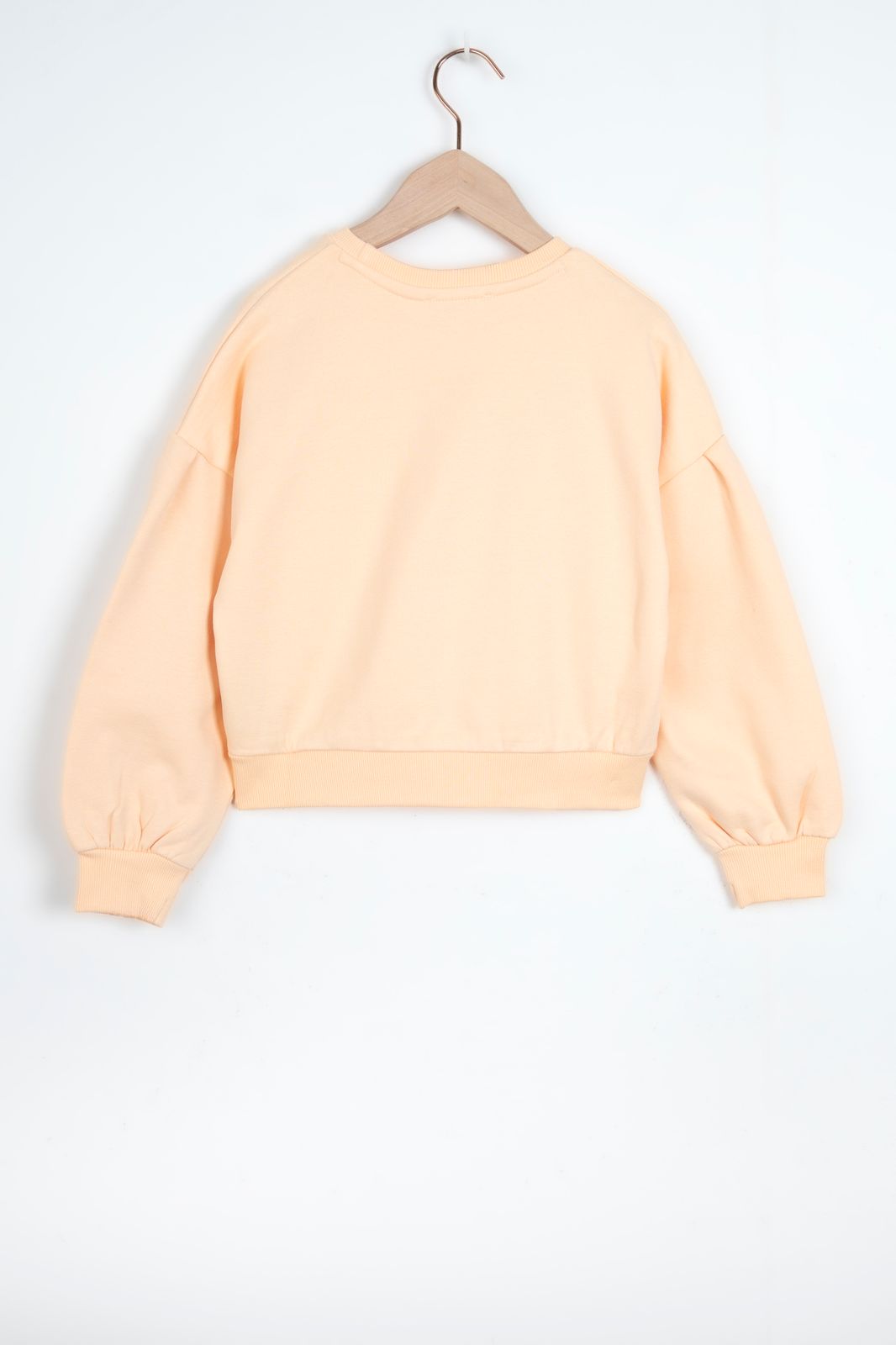 Pastel oranje sweater met badstof print
