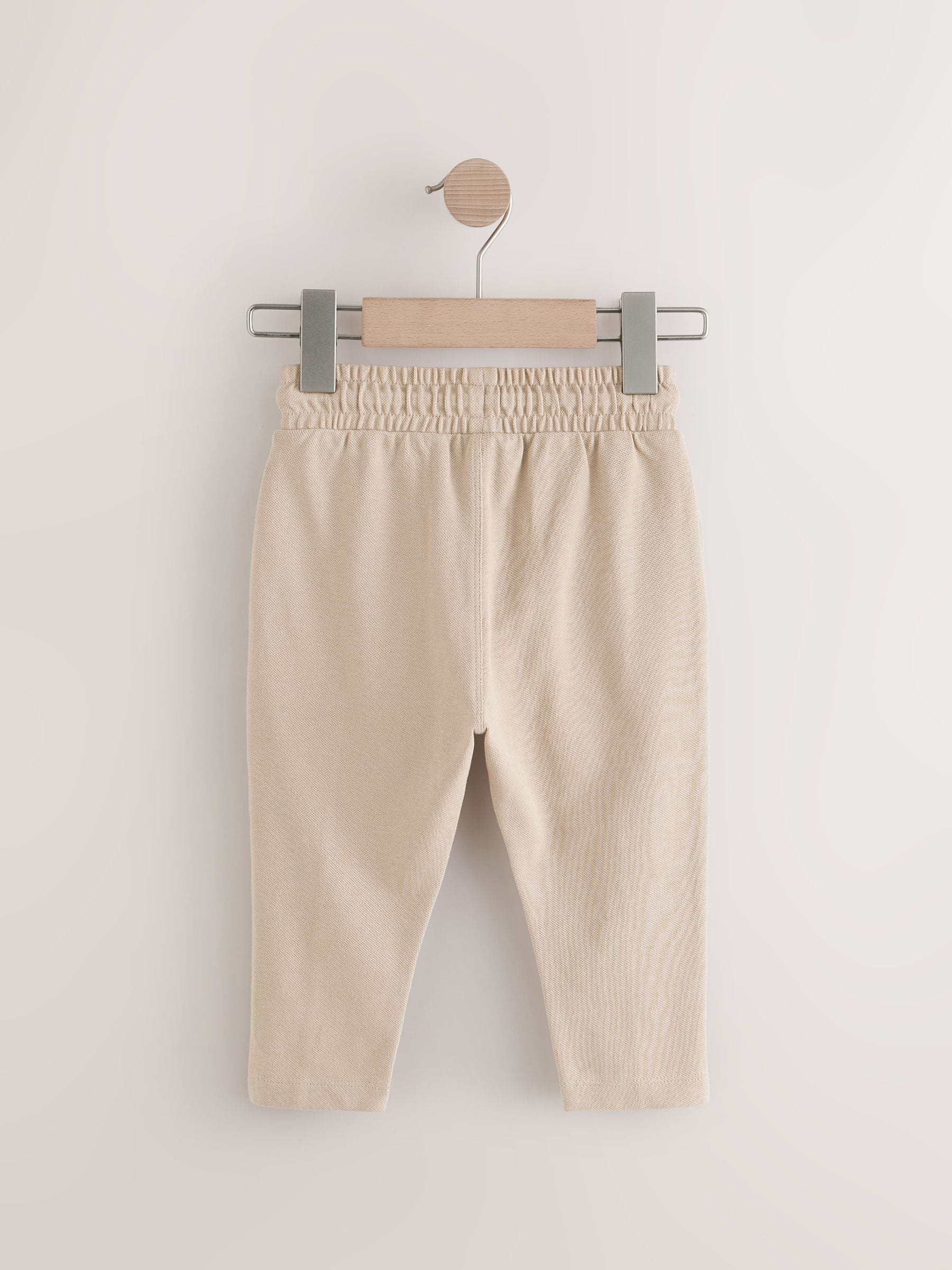 Pastelgeel - Pintuck joggingbroek van 100% katoen (3mnds-7jr)