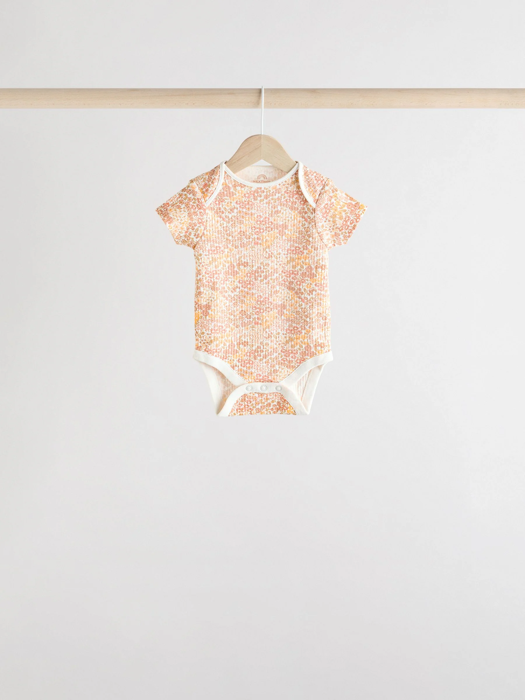 Abrikooskleur met fijne print - 5 Babyrompertjes met korte mouwen