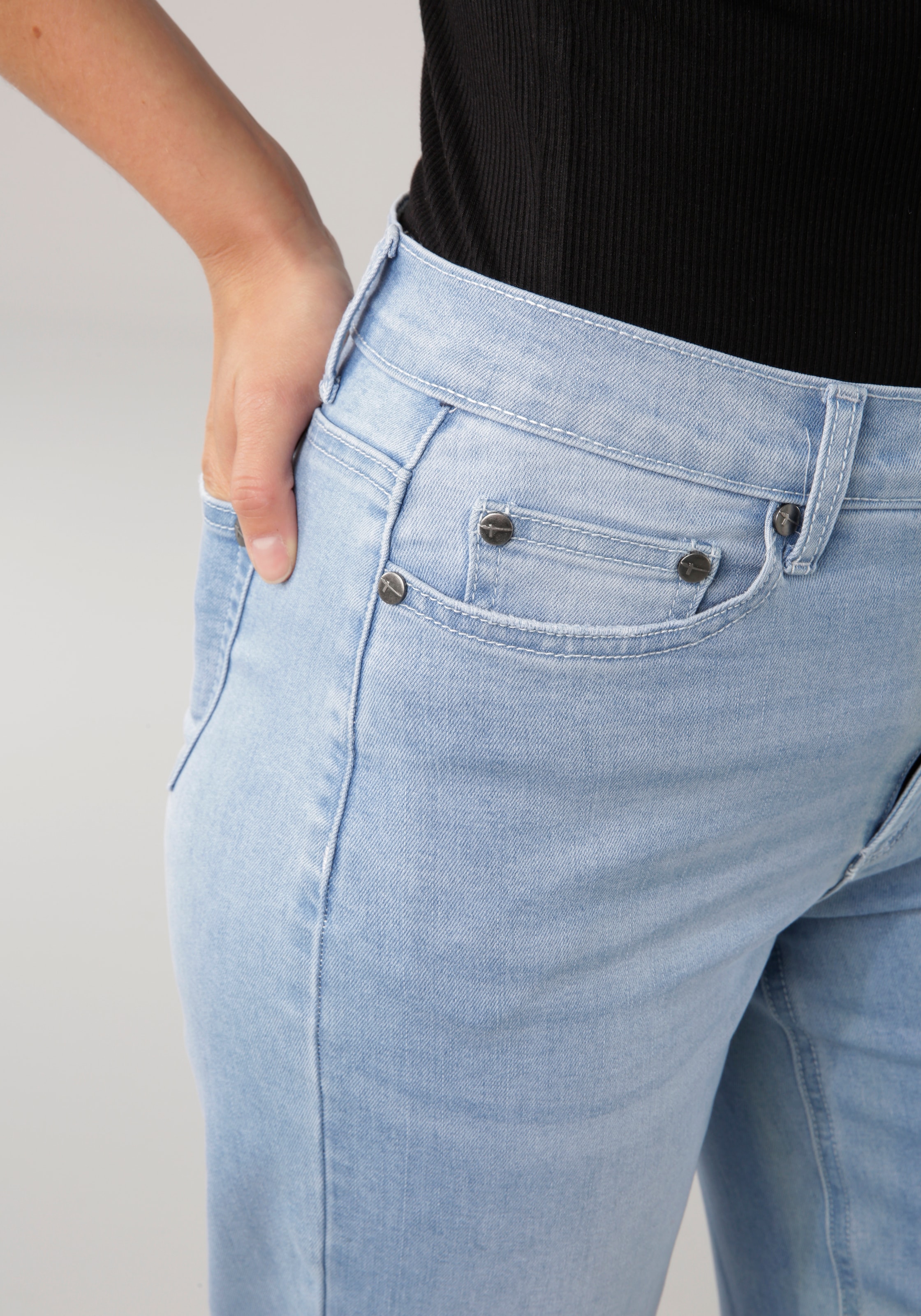 Tamaris Weite Jeans , figurbetonte Passform,  mit Eingrifftaschen,  hohe Leibhöhe