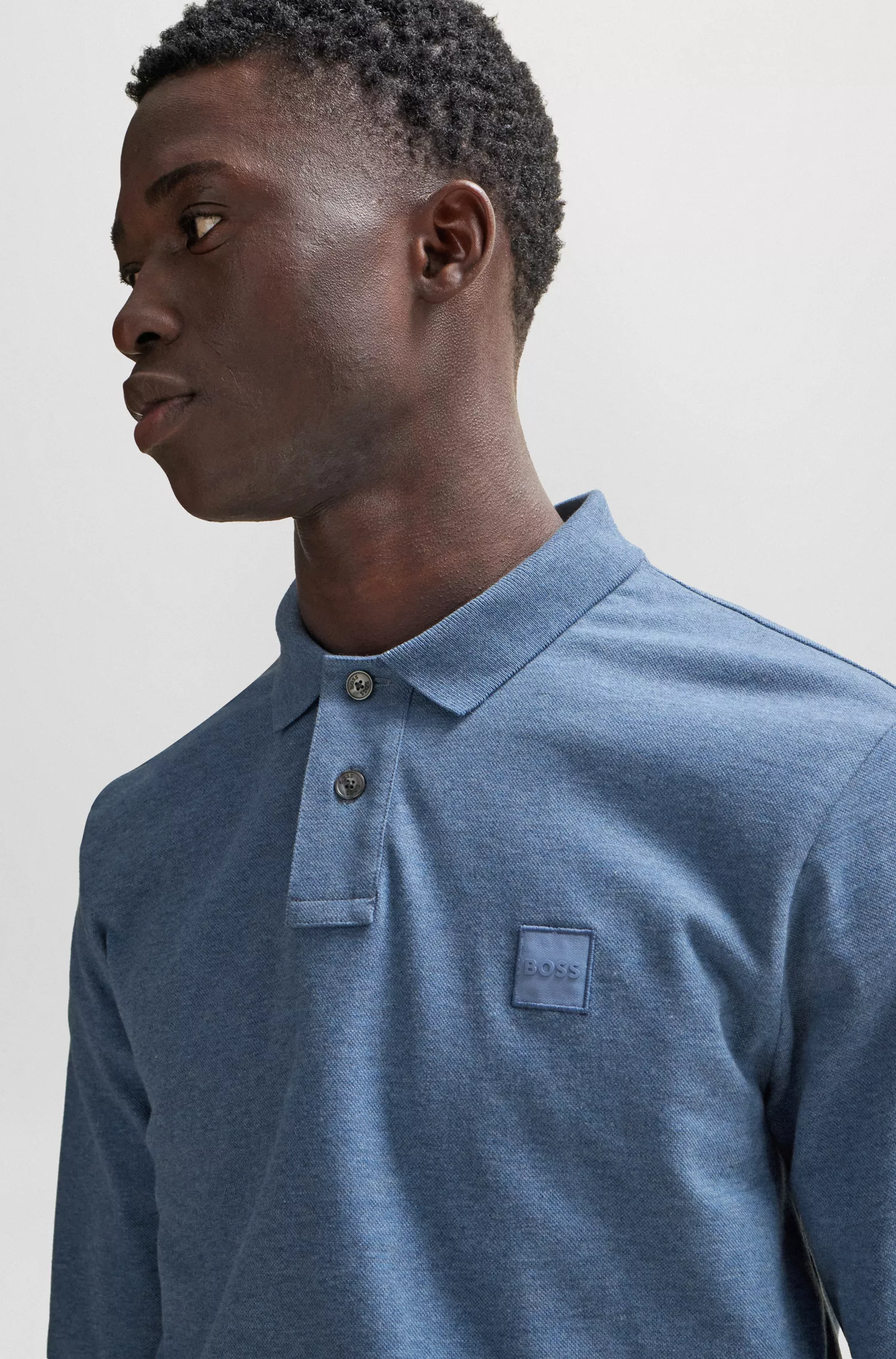 Camisa polo BOSS laranja em algodão stretch com etiqueta com o logotipo.