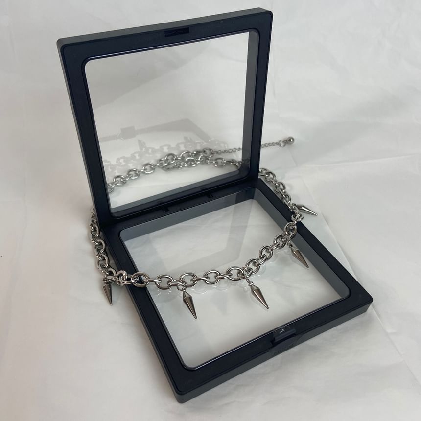 PANGU - Armband met studs en franjes