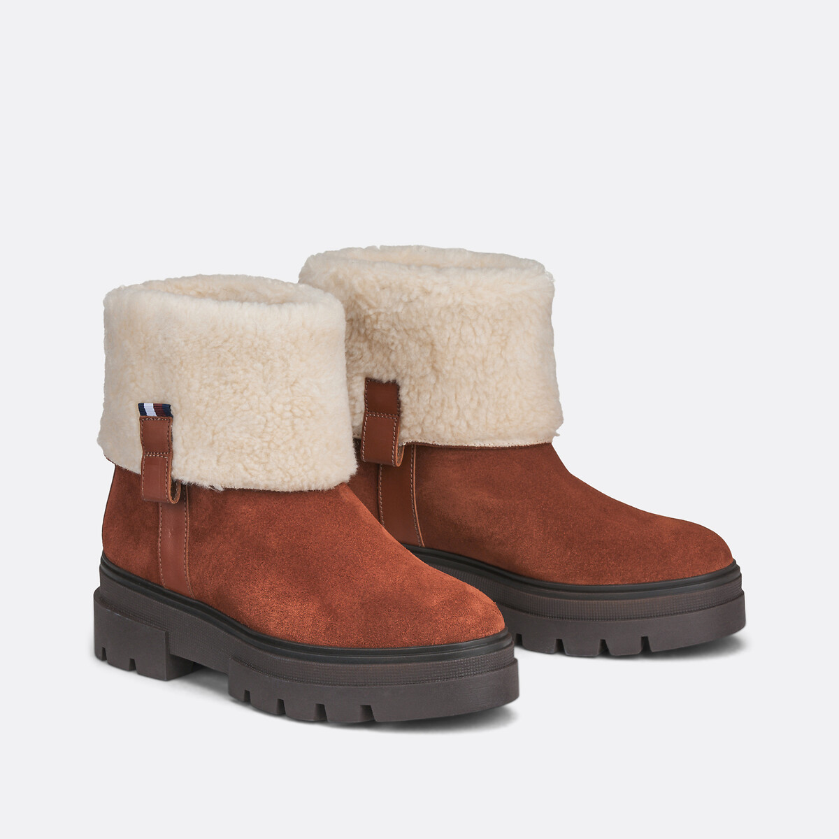 TOMMY HILFIGER<br>Botas de tornozelo em couro forrado