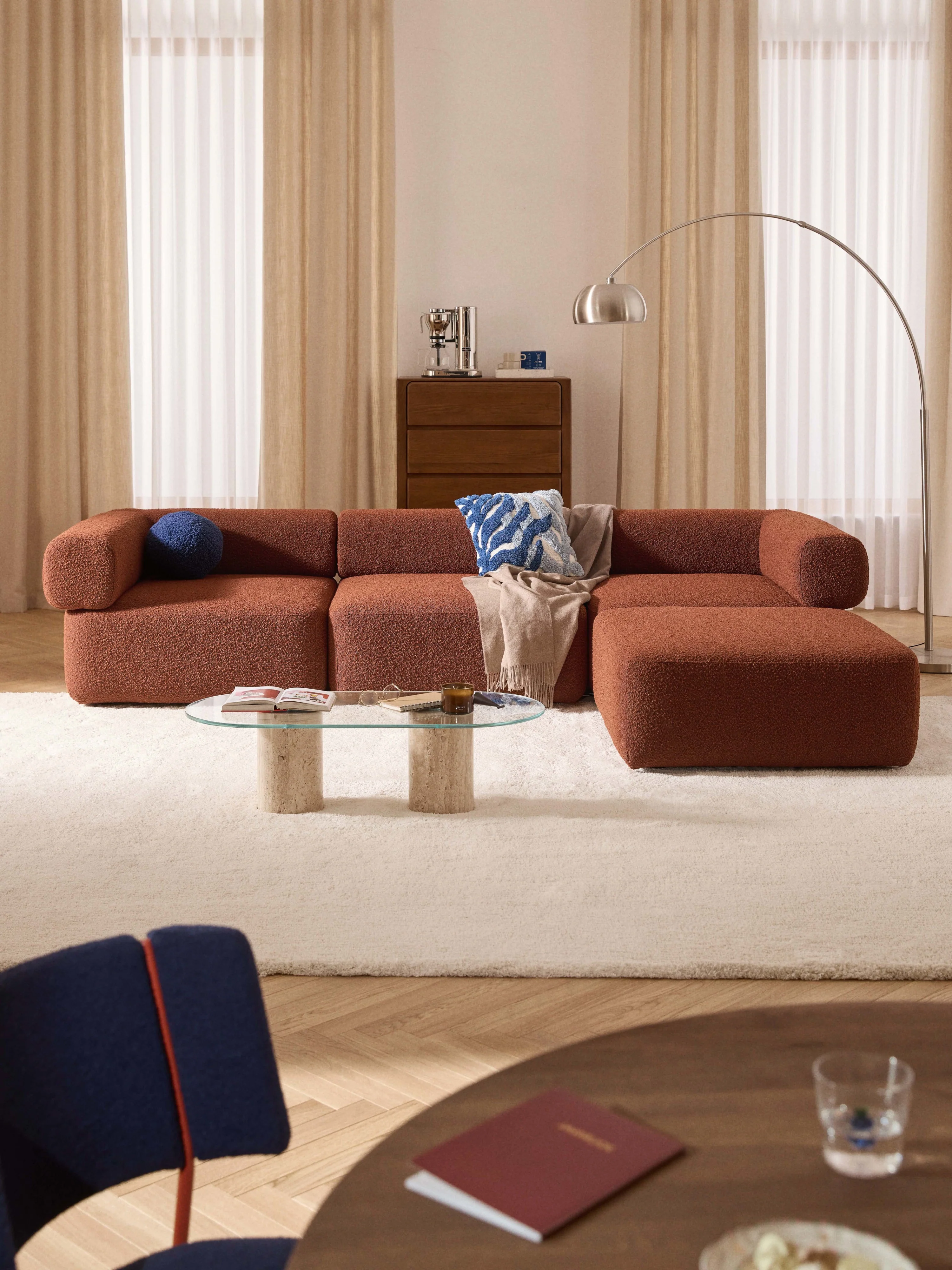 Modulaire bank Anton (4-zits) met poef (links/rechts) van bouclé