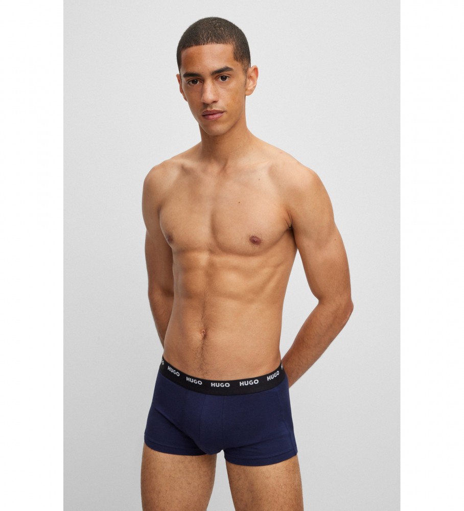 Conjunto de 5 cuecas boxer elásticas HUGO nas cores verde, azul-marinho e preta.