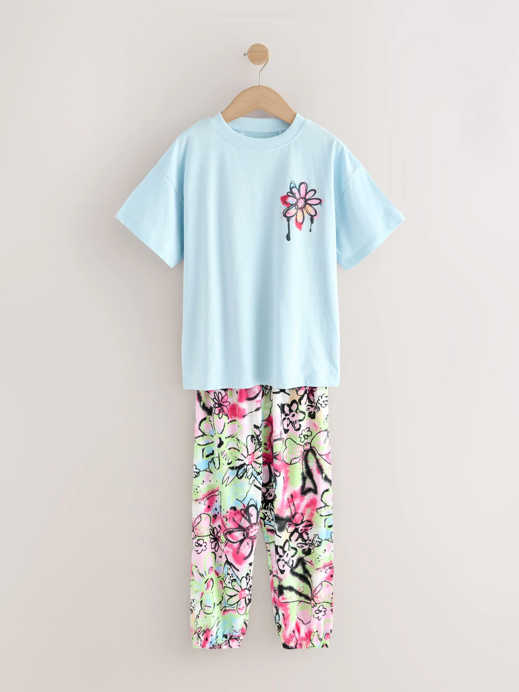 Blauw/ecru graffiti strik - Verpakking van 2 pyjama's met joggingbroek (3 - 16 jr)