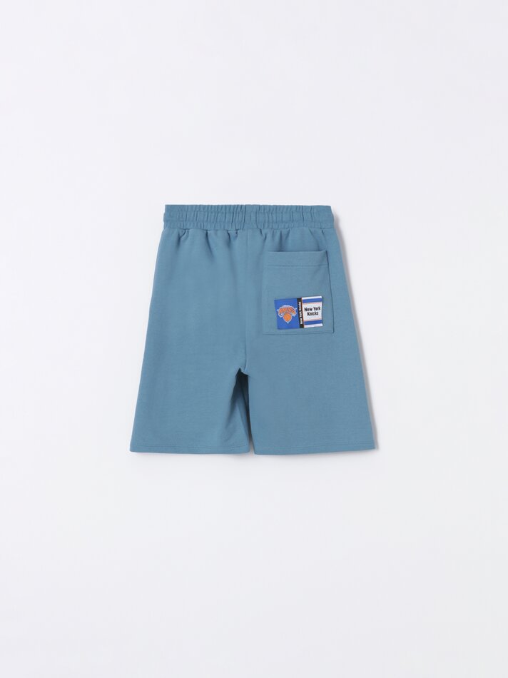 Bermuda de pelúcia do New York Knicks da NBA - Azul Petróleo Claro