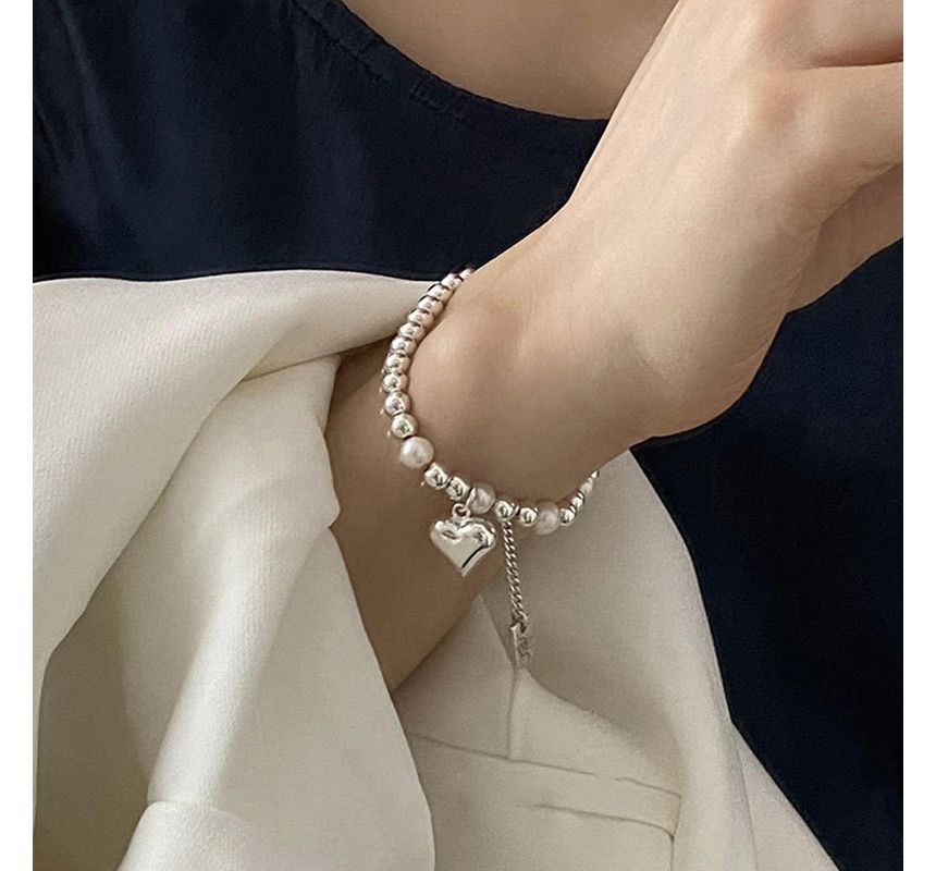 Catharsis - Hartvormige armband van imitatieparels