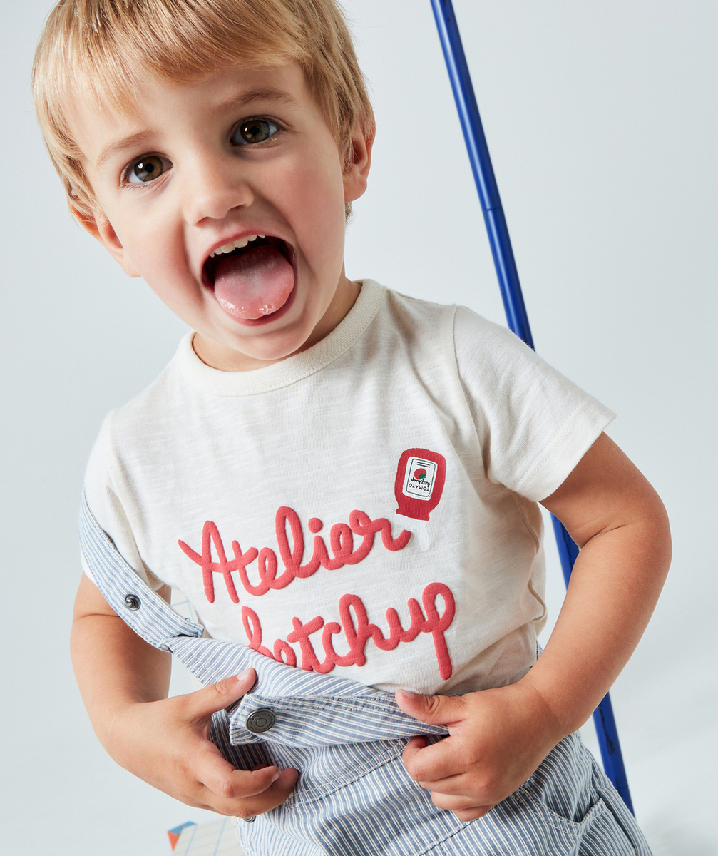 T-SHIRT BÉBÉ GARÇON EN COTON BIO ÉCRU MESSAGE KETCHUP