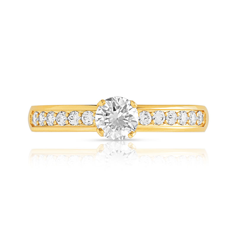 Bague solitaire or 750 jaune diamant 60/100e de carat