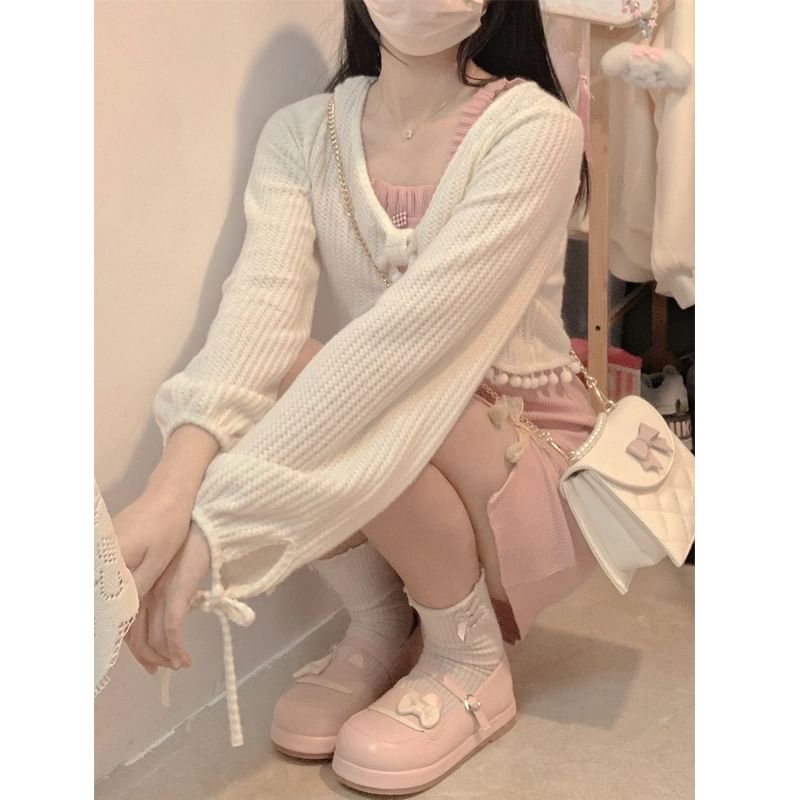 Malrowe - V-hals effen cropped blouse met pompons / mini A-lijn jurk met spaghettibandjes en strik aan de voorkant en split