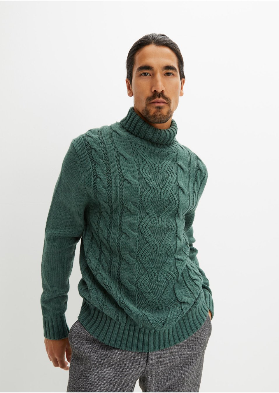 Pull col roulé à motif torsadé