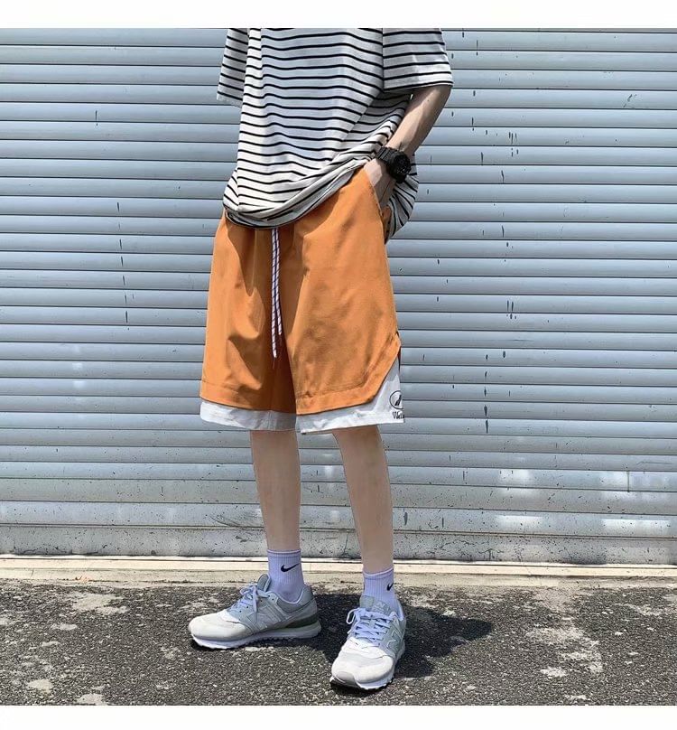Macho - Tweekleurige shorts met wijde pijpen en trekkoord in de taille