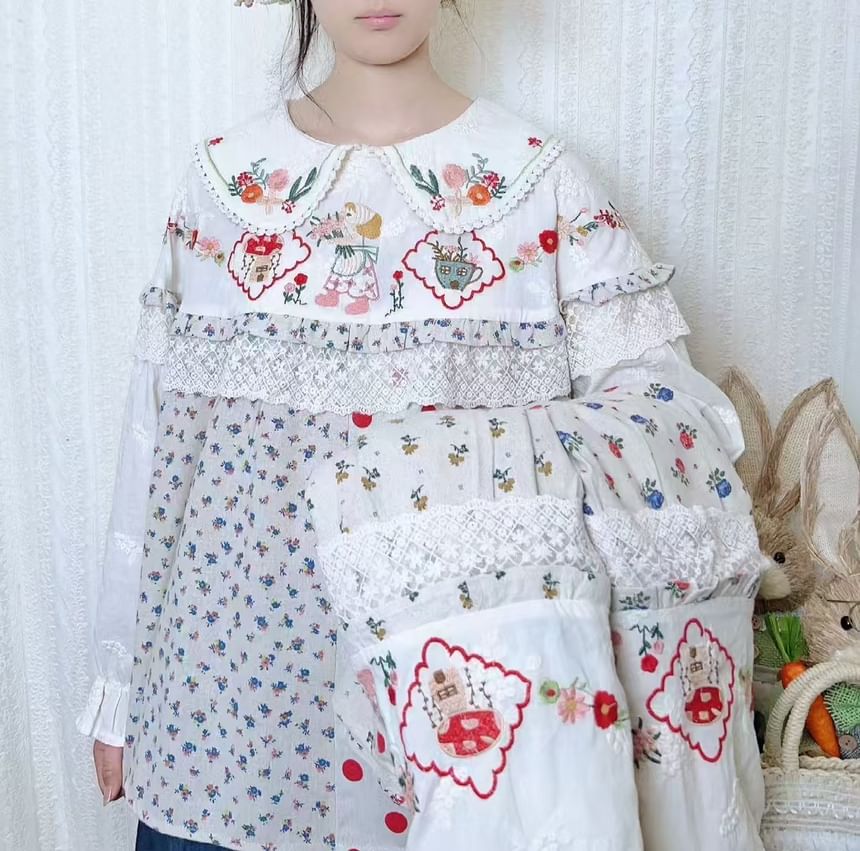 Aigan - Blouse met pofmouwen en kantversiering